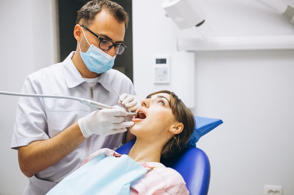 a women is getting dental treatment